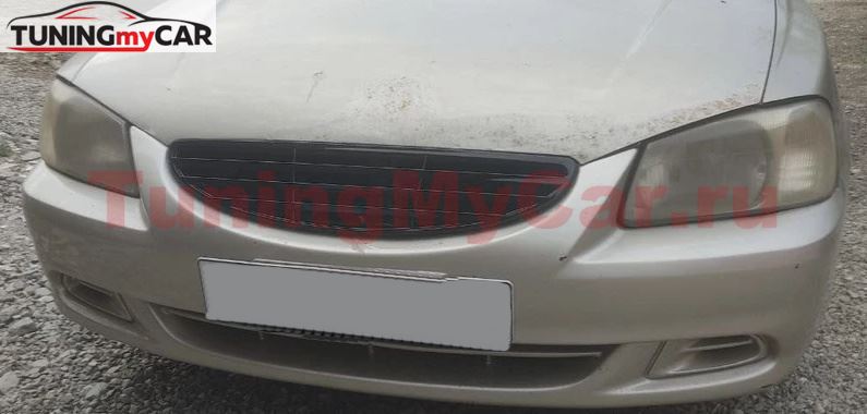 Решетка радиатора Hyundai Accent (три полосы глянец)